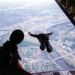 Skydiver jumping from plane